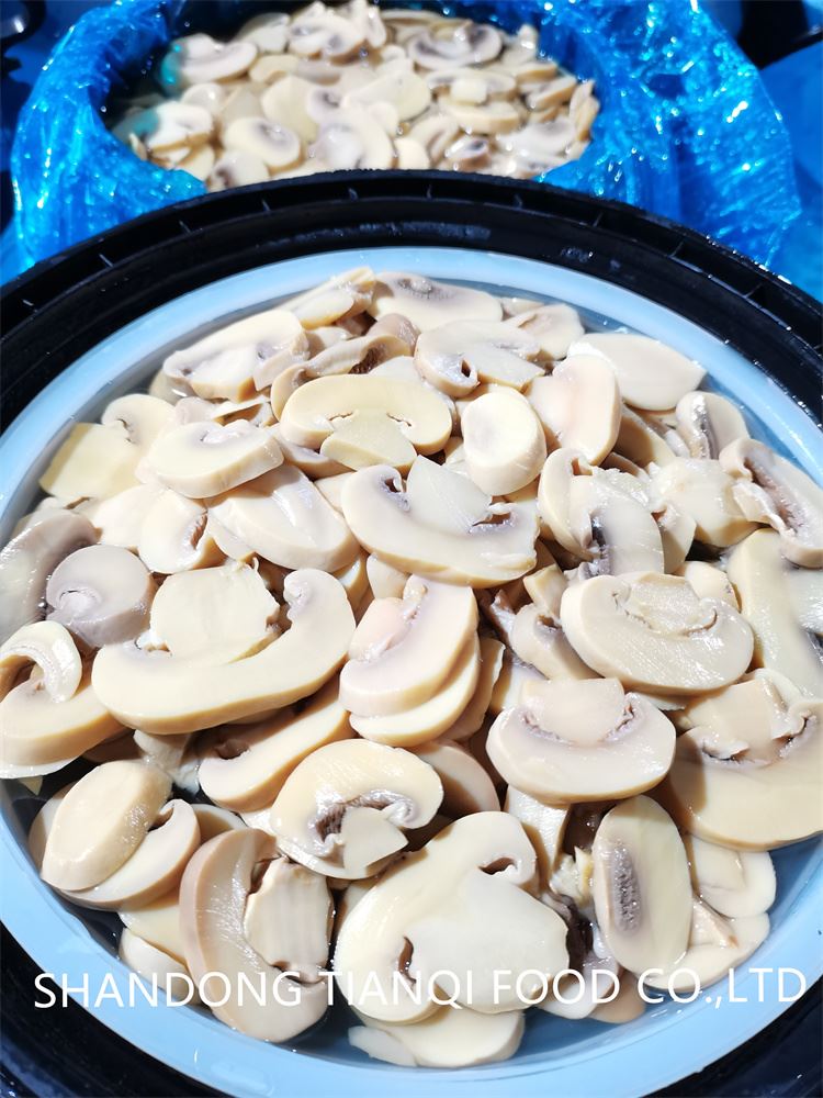 Healthy sliced white mushroom in drums